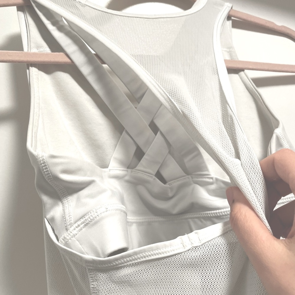 White Lululemon top with built in sports bra!